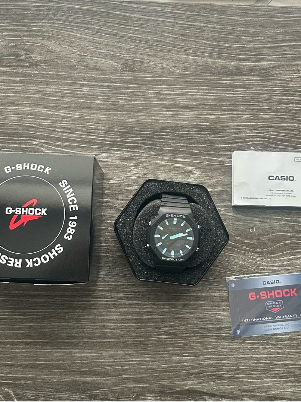 Casio G-SHOCK Black Watch with Teal Accents